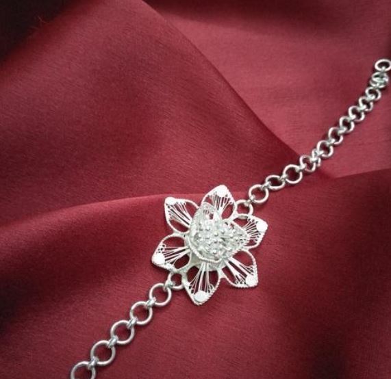 silver rakhi